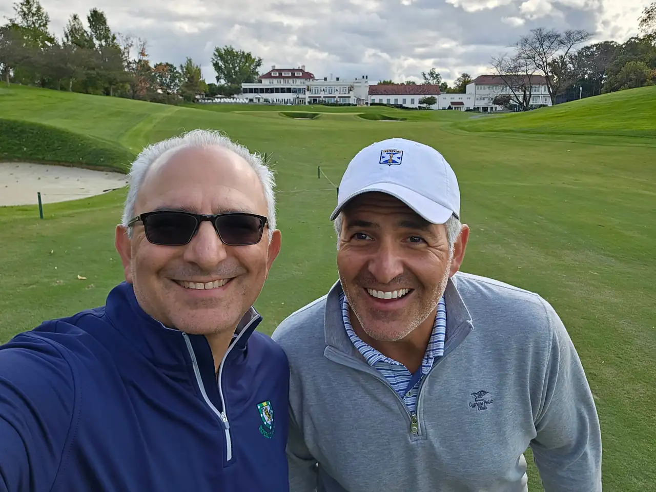 The Perry Bros with the Columbia Country Club clubhouse in the background