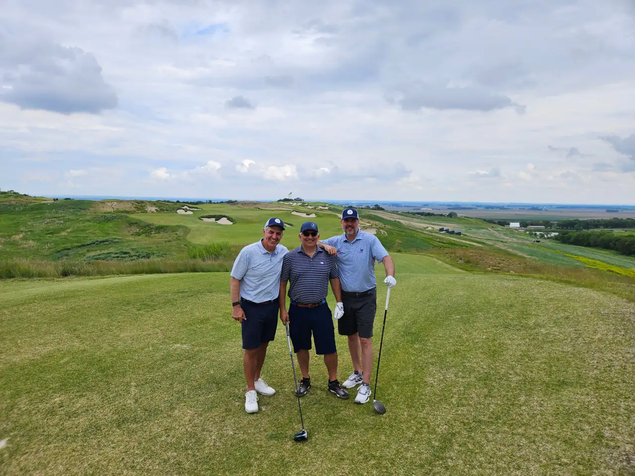 The Perry Bros and Brandon on a high tee at Landmand Golf Club in the Nebraska hills