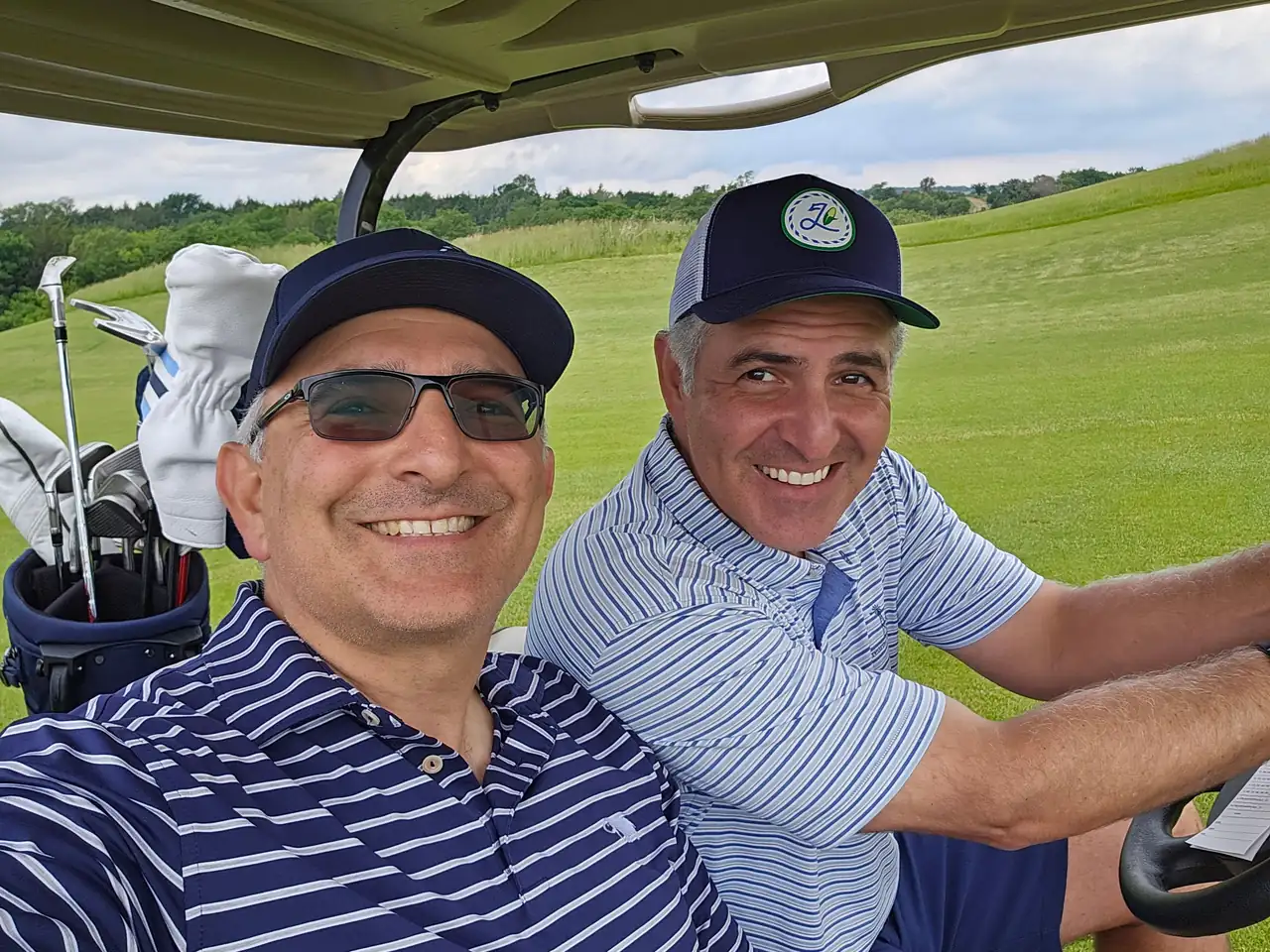 The Perry Bros in the cart at Landmand Golf Club