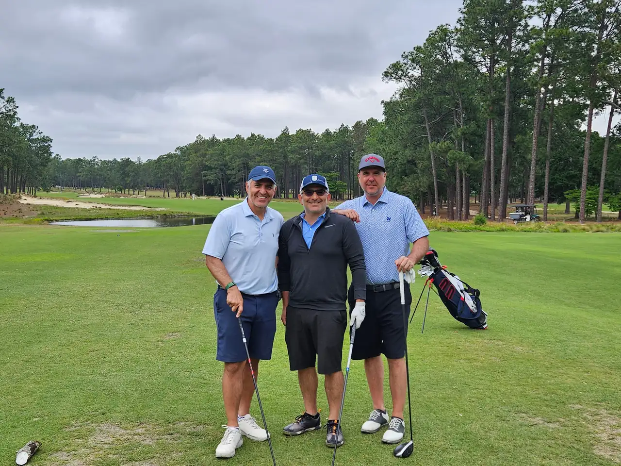 The Perry Bros and Brandon on the first tee of Pinehurst No. 2
