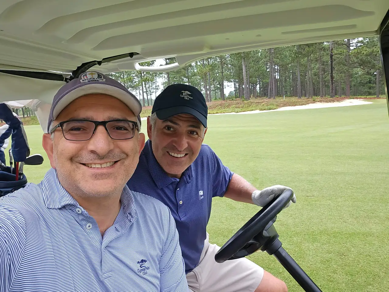The Perry Bros in a cart on Pinehurst No. 8 early in the morning