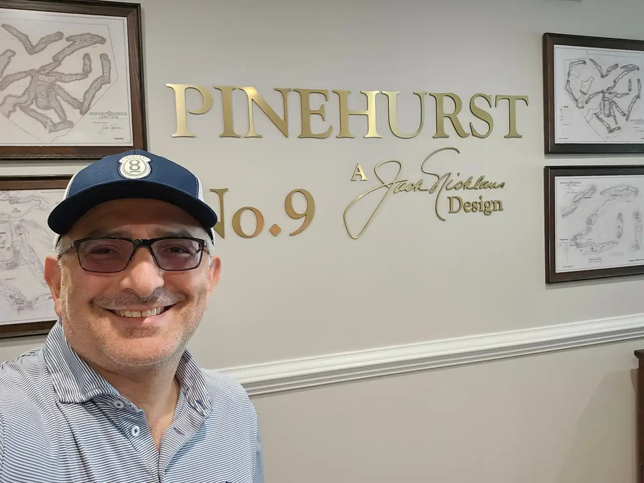 Jon Perry at the Pinehurst No. 9 sign, a Jack Nicklaus design